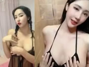 Puta chinesa de seios grandes a provocar